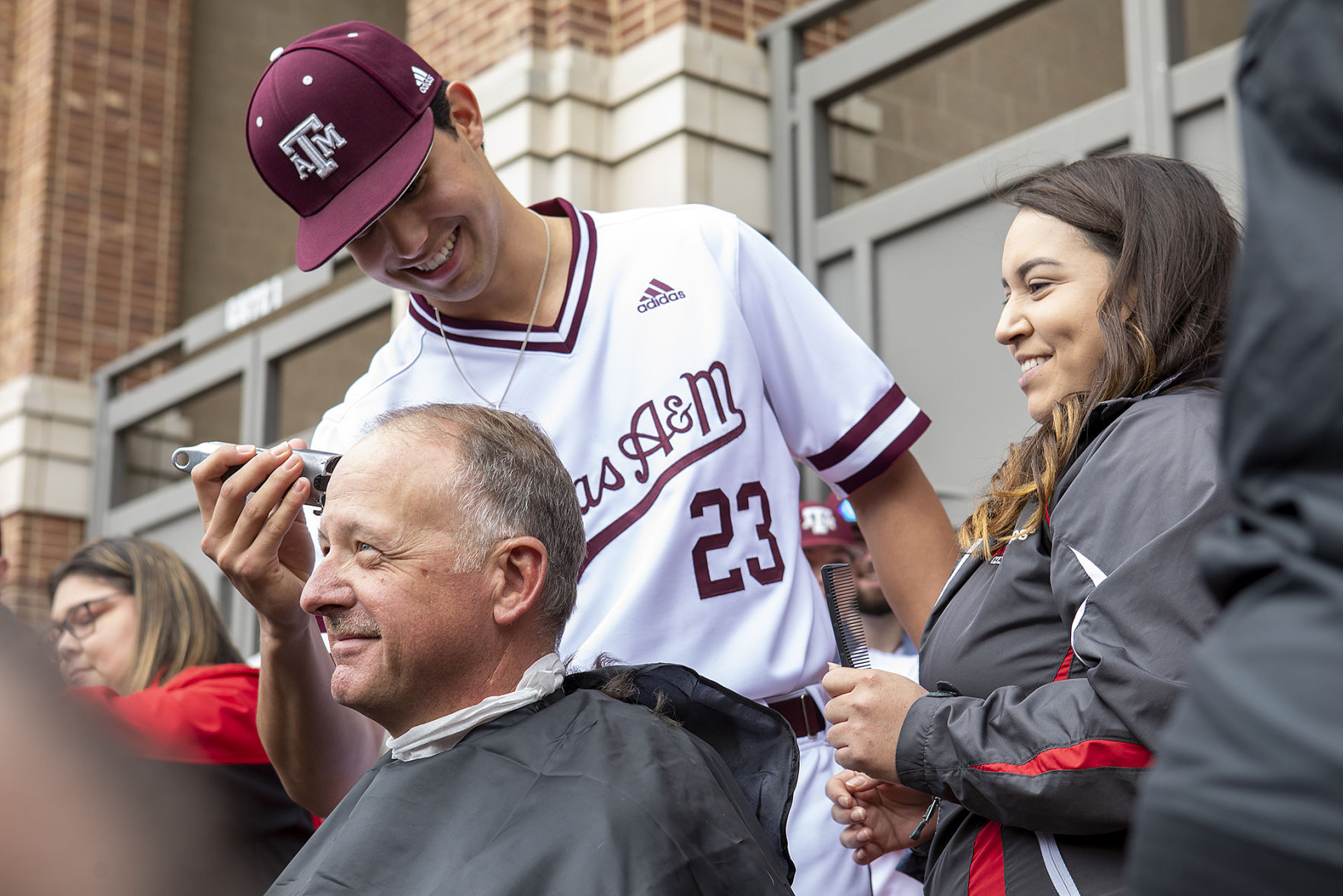 A&M baseball head shaving for cancer